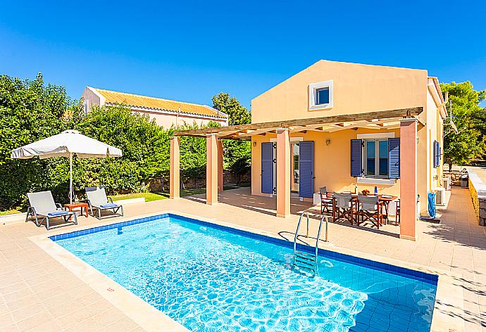 Beautiful villa with private pool and terrace with sea views . - Antigoni Beach House . (Galería de imágenes) }}