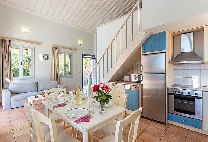 Equipped kitchen . - Antigoni Beach House . (Photo Gallery) }}