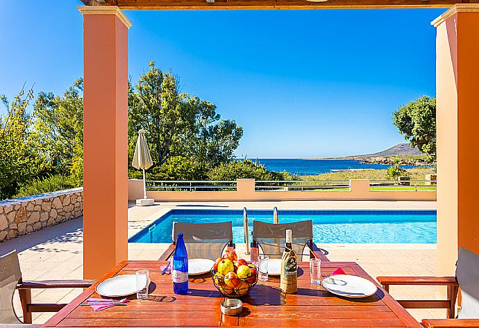 Sheltered terrace area with sea views . - Antigoni Beach House . (Galleria fotografica) }}