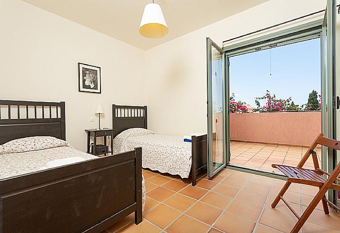 Twin bedroom with A/C and deck access . - Villa Vali . (Photo Gallery) }}