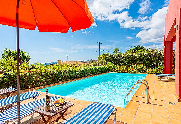 Private pool, terrace, and garden with sea views . - Villa Vali . (Galleria fotografica) }}