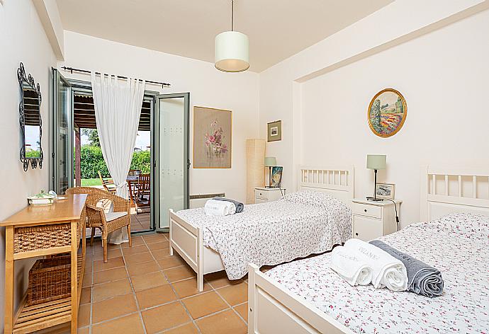 Twin bedroom with A/C and terrace access . - Villa Nora . (Photo Gallery) }}