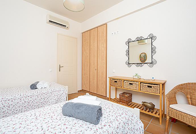 Twin bedroom with A/C and terrace access . - Villa Nora . (Photo Gallery) }}