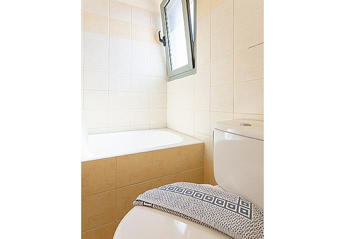 En suite bathroom with bath and shower . - Villa Katerina . (Photo Gallery) }}