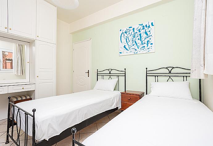 Twin bedroom with A/C and terrace access . - Villa Youla . (Photo Gallery) }}