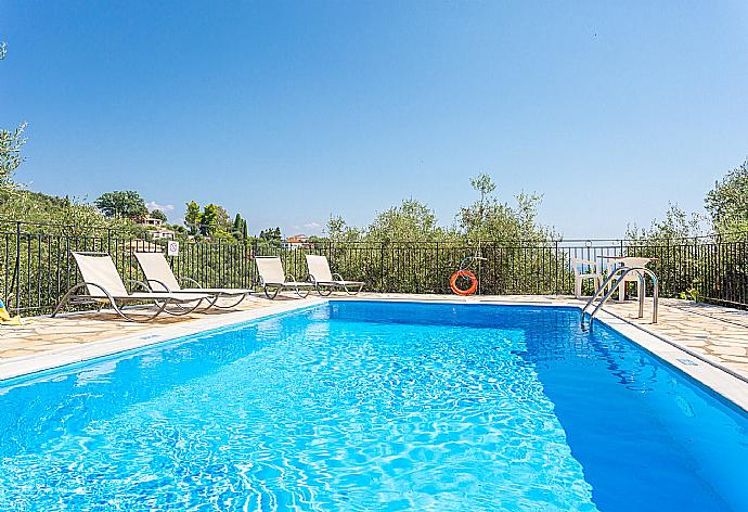 Private pool and terrace with sea views . - Villa Vasillis . (Photo Gallery) }}