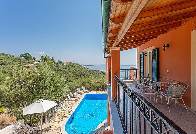 View of pool from balcony on first floor . - Villa Vasillis . (Photo Gallery) }}