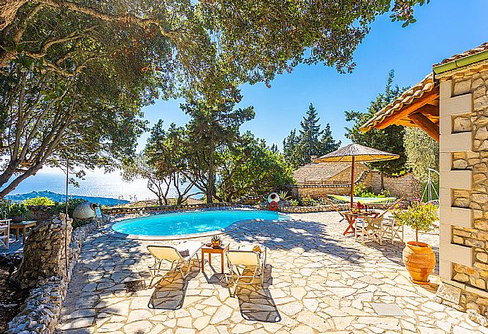 Private pool, terrace, and garden with sea views . - Villa Nionios . (Галерея фотографий) }}