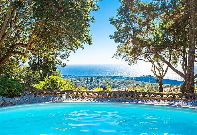 Private pool, terrace, and garden with sea views . - Villa Nionios . (Photo Gallery) }}