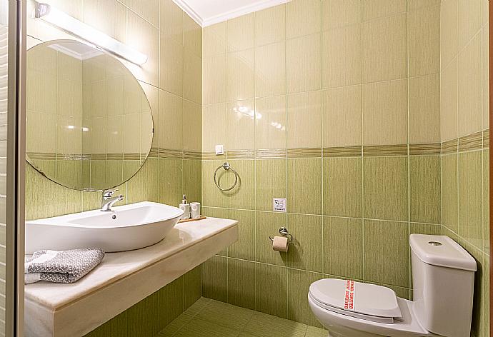 En suite bathroom with shower . - Villa Georgios . (Photo Gallery) }}