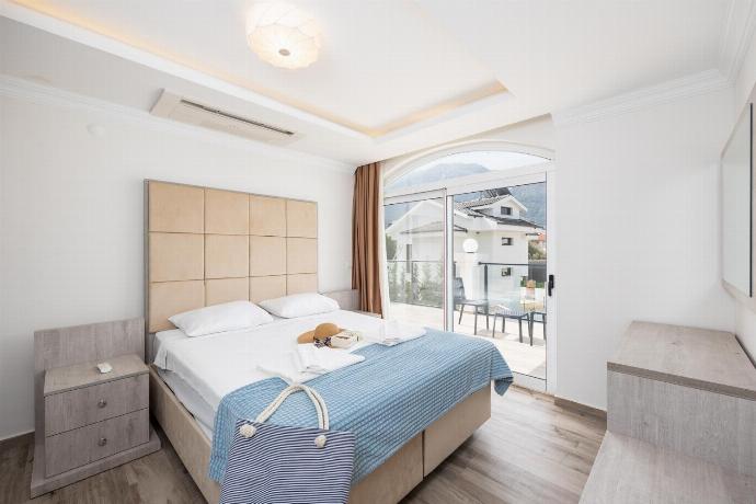 Double bedroom with A/C . - Orka World Villa 2 . (Photo Gallery) }}