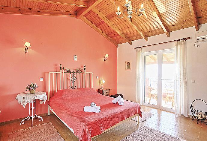 Double bedroom with A/C and balcony access . - Villa Astarti . (Photo Gallery) }}