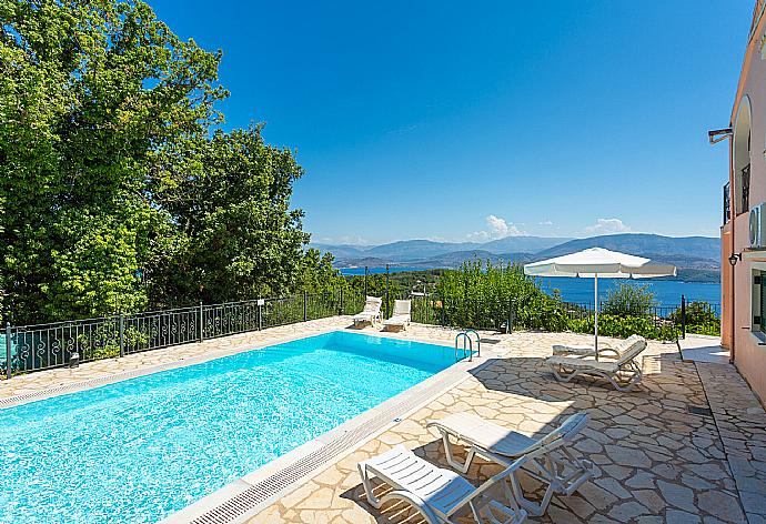 Private pool and terrace with sea views . - Villa Eleni . (Photo Gallery) }}