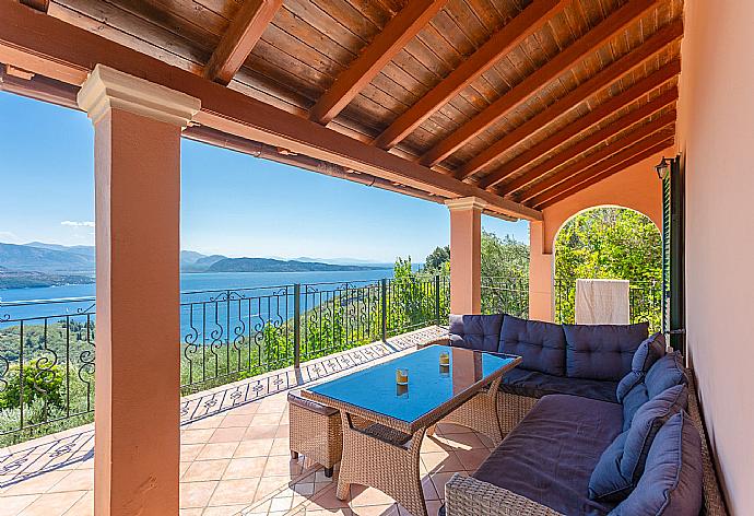 Sheltered balcony with panoramic sea views . - Villa Eleni . (Photo Gallery) }}