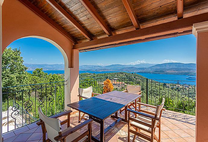 Sheltered balcony with panoramic sea views . - Villa Eleni . (Photo Gallery) }}