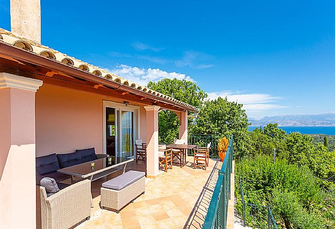 Sheltered balcony with panoramic sea views . - Villa Eleni . (Photo Gallery) }}