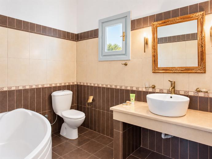 Bathroom with bath . - Villa Ourania . (Photo Gallery) }}