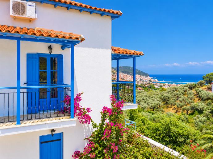 Balconies with panoramic views of sea and Skopelos Town . - Villa Ourania . (Photo Gallery) }}