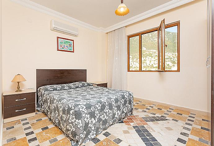 Double bedroom with A/C . - Mango Apartment . (Галерея фотографий) }}