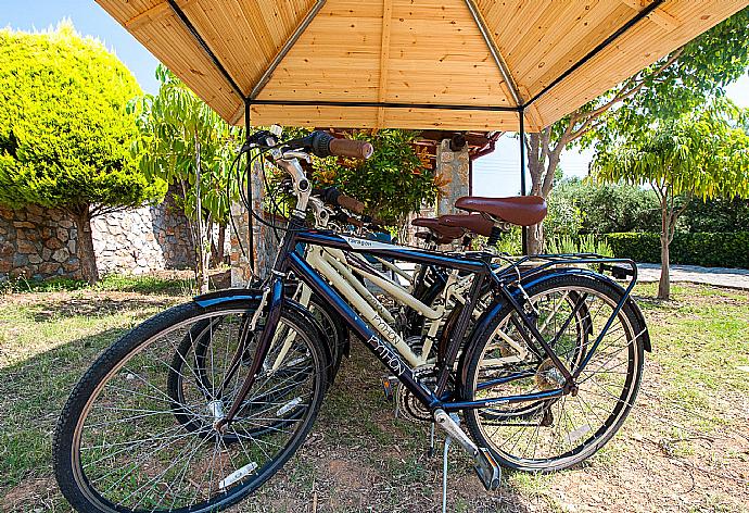 Bikes in garden area of Eleon Villas . - Villa Tzina . (Photo Gallery) }}