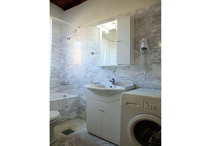 Bathroom with bath . - Villa Tzina . (Photo Gallery) }}