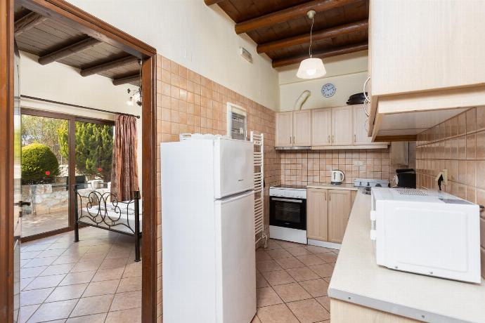 Equipped kitchen . - Villa Melina . (Galerie de photos) }}