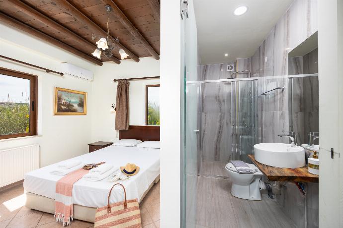 Double bedroom with en suite bathroom and A/C . - Villa Melina . (Photo Gallery) }}
