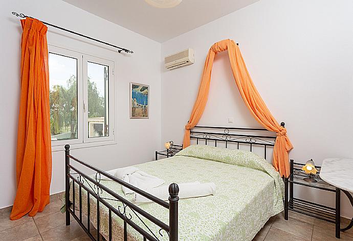 Double bedroom on first floor with A/C and en suite bathroom . - Villa Alexandra . (Photo Gallery) }}