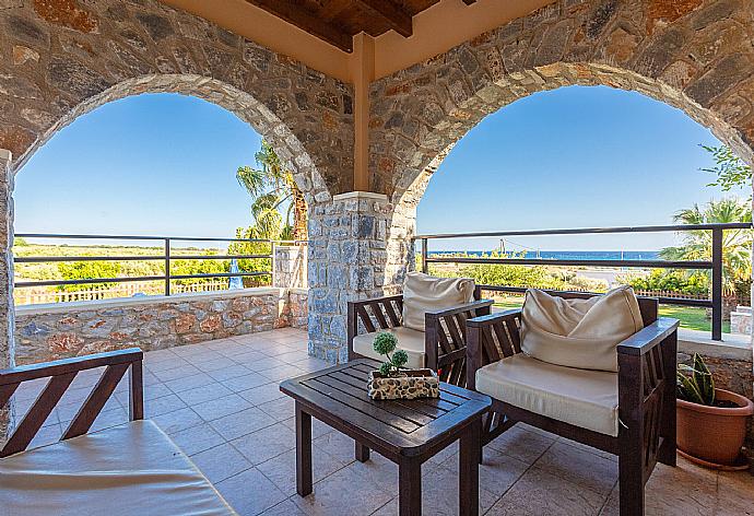 Sheltered terrace area with sea views . - Andreas Beach Villa . (Galerie de photos) }}