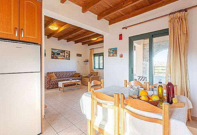 Equipped kitchen and dining area . - Andreas Beach Villa . (Галерея фотографий) }}