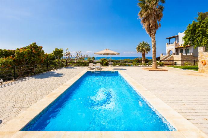 Private pool and terrace with sea views . - Andreas Beach Villa . (Fotogalerie) }}