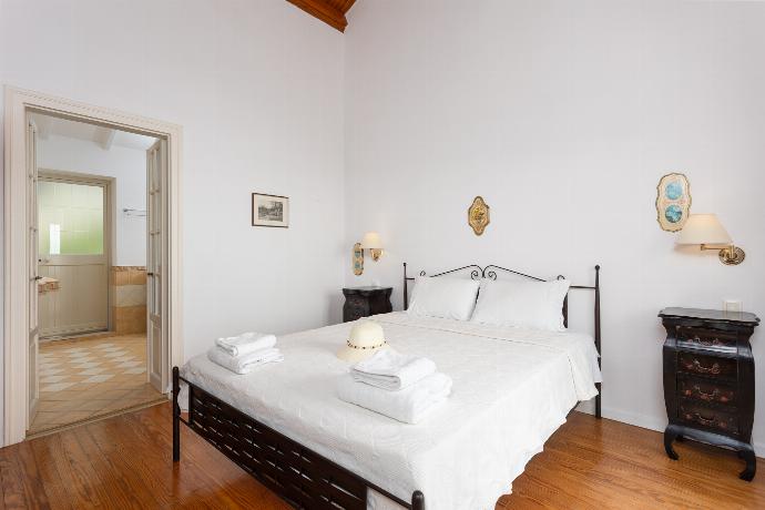 Double bedroom on first floor with en suite bathroom, A/C, sea views, and balcony access . - Villa Anastasia . (Photo Gallery) }}