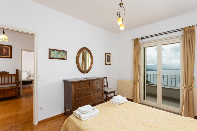 Double bedroom on first floor with A/C, sea views, and balcony access . - Villa Anastasia . (Galería de imágenes) }}