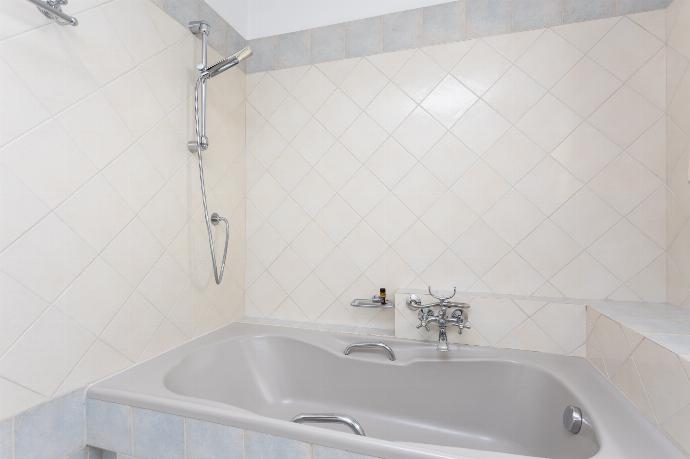 Family bathroom on first floor with bath and shower . - Villa Anastasia . (Photo Gallery) }}