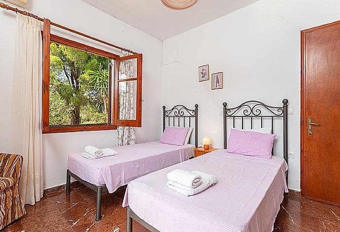 Twin bedroom with A/C and terrace access . - Cochelli Villa Lower . (Photo Gallery) }}