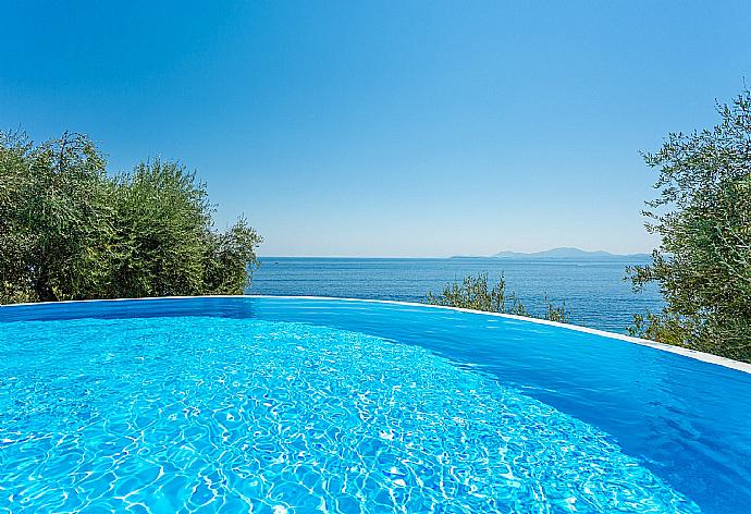 Private infinity pool with panoramic sea views . - Villa Petros . (Photo Gallery) }}