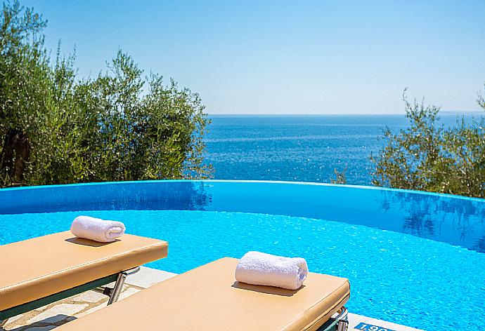 Private infinity pool with panoramic sea views . - Villa Petros . (Photo Gallery) }}