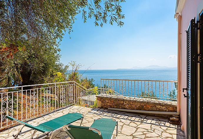 Upper terrace area with sea views . - Villa Petros . (Photo Gallery) }}