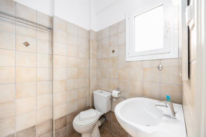 En suite bathroom with shower . - Villa Ioanna Agios Stephanos . (Photo Gallery) }}