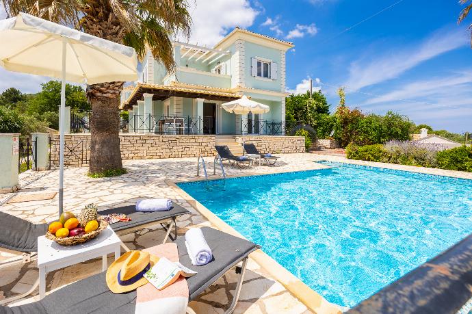 Beautiful villa with private pool and terrace with sea views . - Villa Ioanna Agios Stephanos . (Photo Gallery) }}