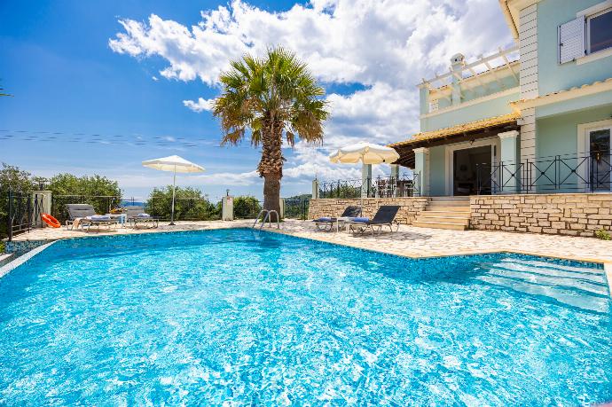 Beautiful villa with private pool and terrace with sea views . - Villa Ioanna Agios Stephanos . (Photo Gallery) }}