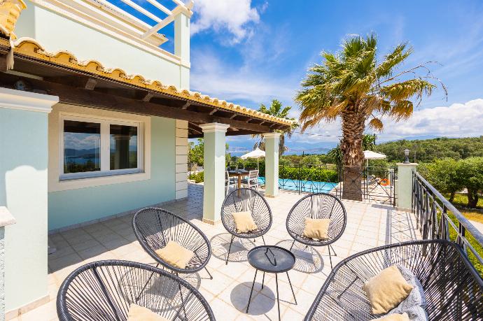 Terrace area . - Villa Ioanna Agios Stephanos . (Photo Gallery) }}