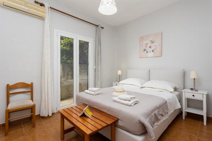 Double bedroom with A/C . - Michalis . (Photo Gallery) }}