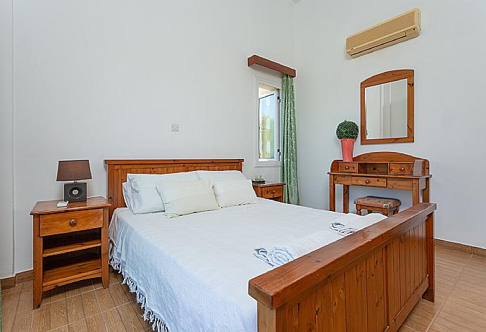 Double bedroom with A/C and balcony access . - Villa Alexandros . (Photo Gallery) }}