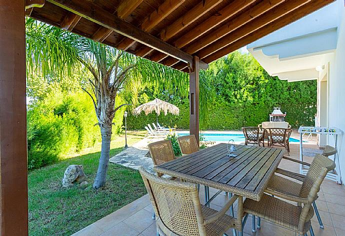 Sheltered terrace area . - Villa Alexandros . (Galleria fotografica) }}