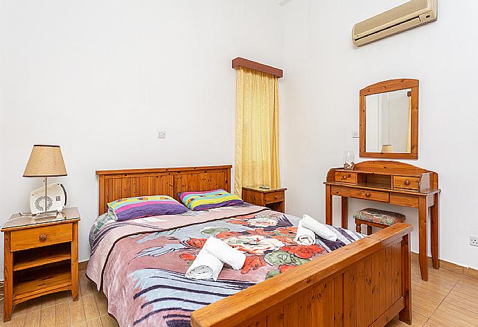 Double bedroom with A/C and balcony access . - Villa Nansoula . (Photo Gallery) }}