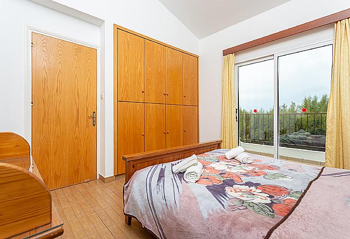 Double bedroom with A/C and balcony access . - Villa Nansoula . (Photo Gallery) }}