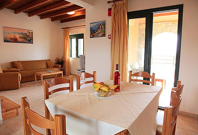 Open plan living area with WiFi, TV, DVD player and terrace access . - Theo Beach Villa . (Fotogalerie) }}