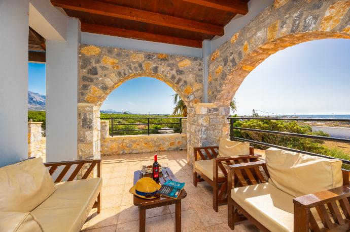 Sheltered terrace area with sea views . - Theo Beach Villa . (Photo Gallery) }}