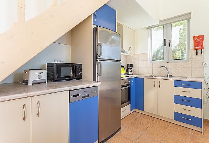 Equipped kitchen  . - Nafsika Beach House . (Photo Gallery) }}